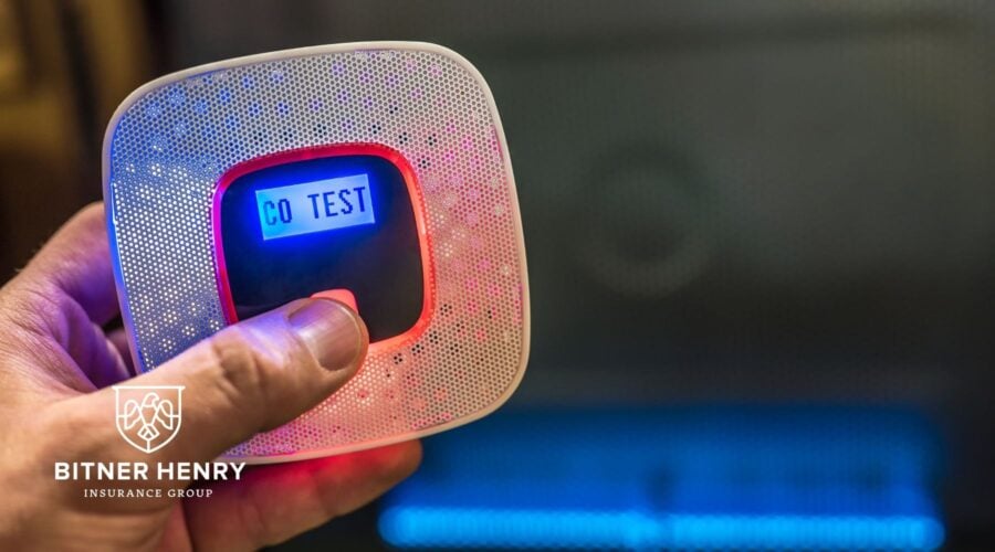 a carbon monoxide detector with the bitner henry logo in the bottom left.