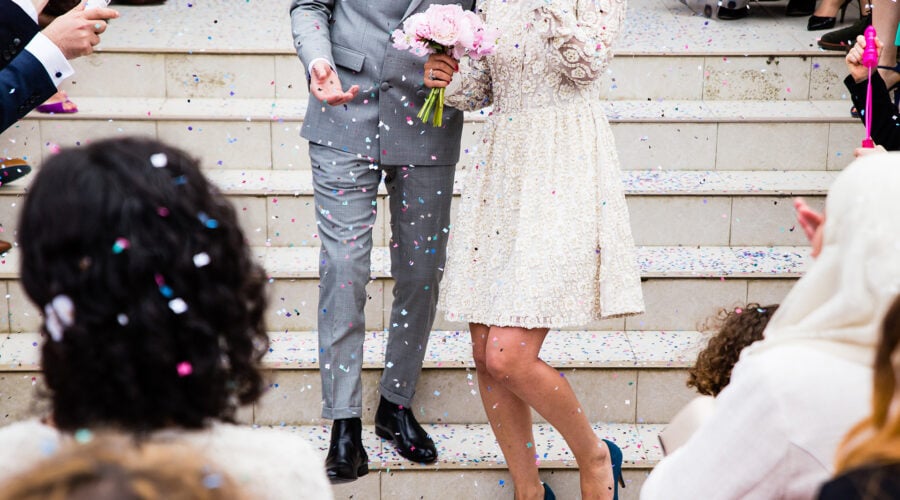 bride and groom coming down stairs