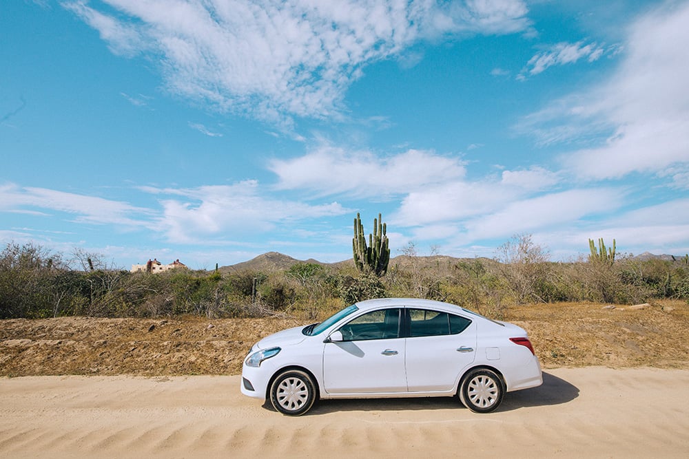 white car in the desert