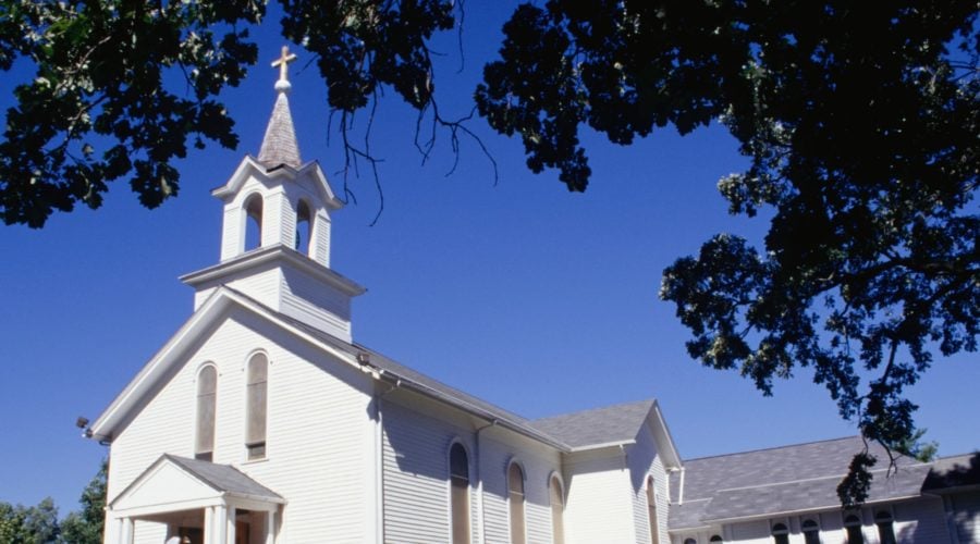 white church against blue sky