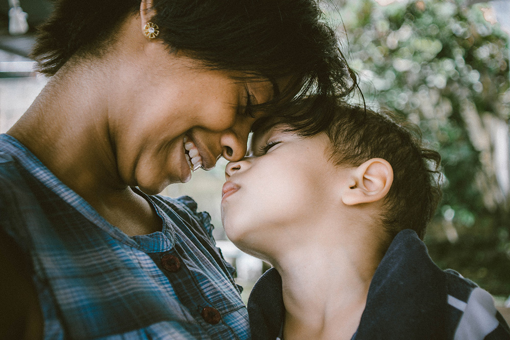 mom and son sharing a hug