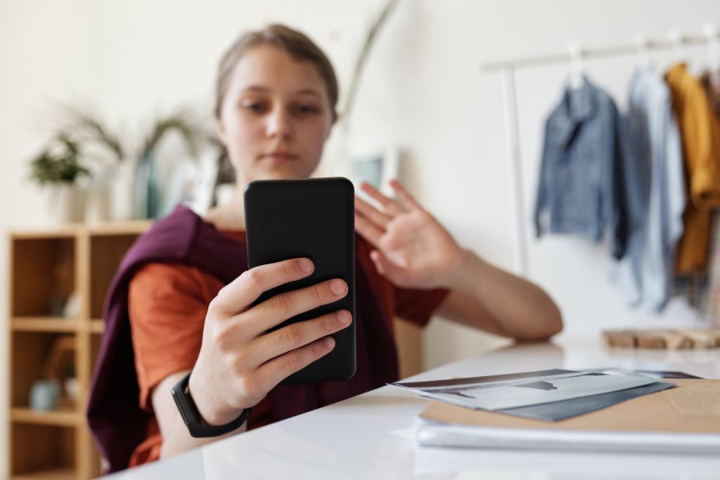 Girl using phone to make video call 