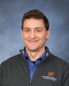 Tim Roddy smiles at the camera