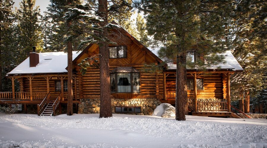 Log cabin in snow