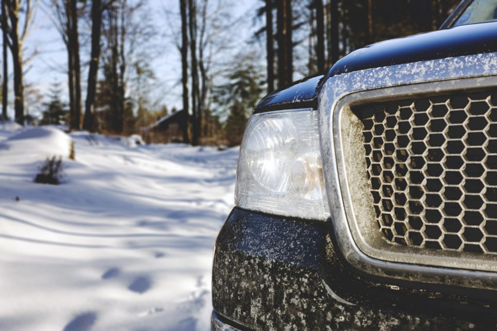 Black SUV in snow