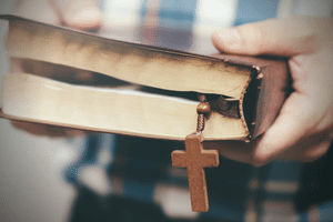Person holding bible
