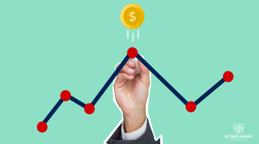 Line chart with hand and dollar sign