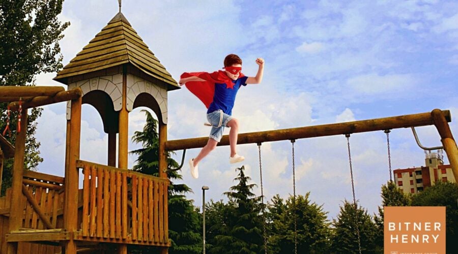 child jumping in playground