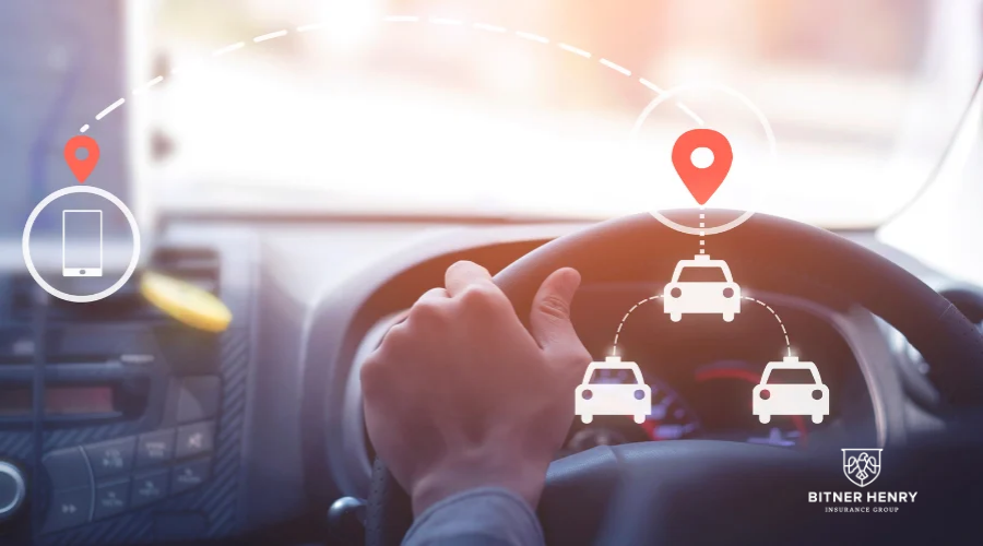 A GPS-tracked car, with someone driving on the wheel. The Bitner Henry logo is on the bottom right.