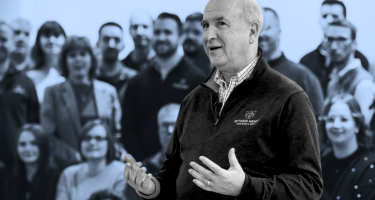 Steve Henry talking to staff