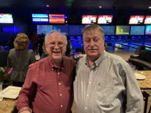Steve and Mike (from Cincinnati insurance) smile at the camera