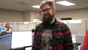Adam with a Leonardo DiCaprio meme Christmas sweater
