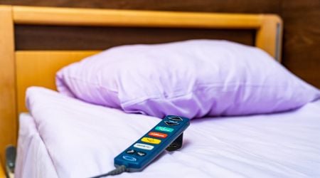 A comfortable-looking hospital bed for partial hospitalization treatment