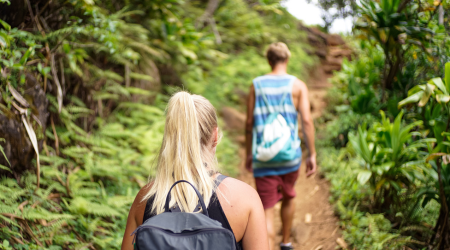 Hiking A helper goes with a recovery patient to enjoy their daily activities.