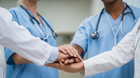 Nurses Nurses and doctors put their hands together to work for partial hospitalization programs