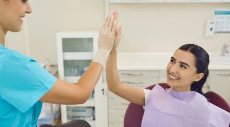 medication-assisted treatment programs A girl high-fives her physician during treatment