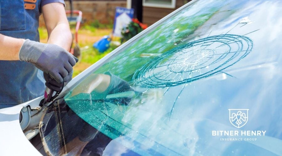 A windshield cracked, covered by other than collision coverage. The Bitner Henry logo is in the bottom right.