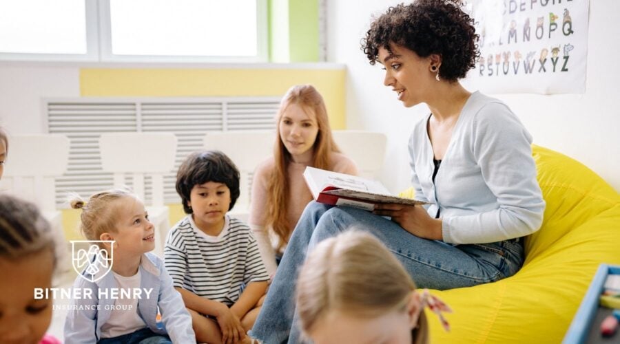A safe children's ministry with smiling children. The Bitner Henry logo is in the bottom left.