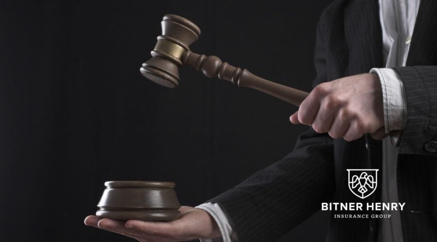 a judge bangs a gavel. The Bitner Henry logo is in the bottom right.