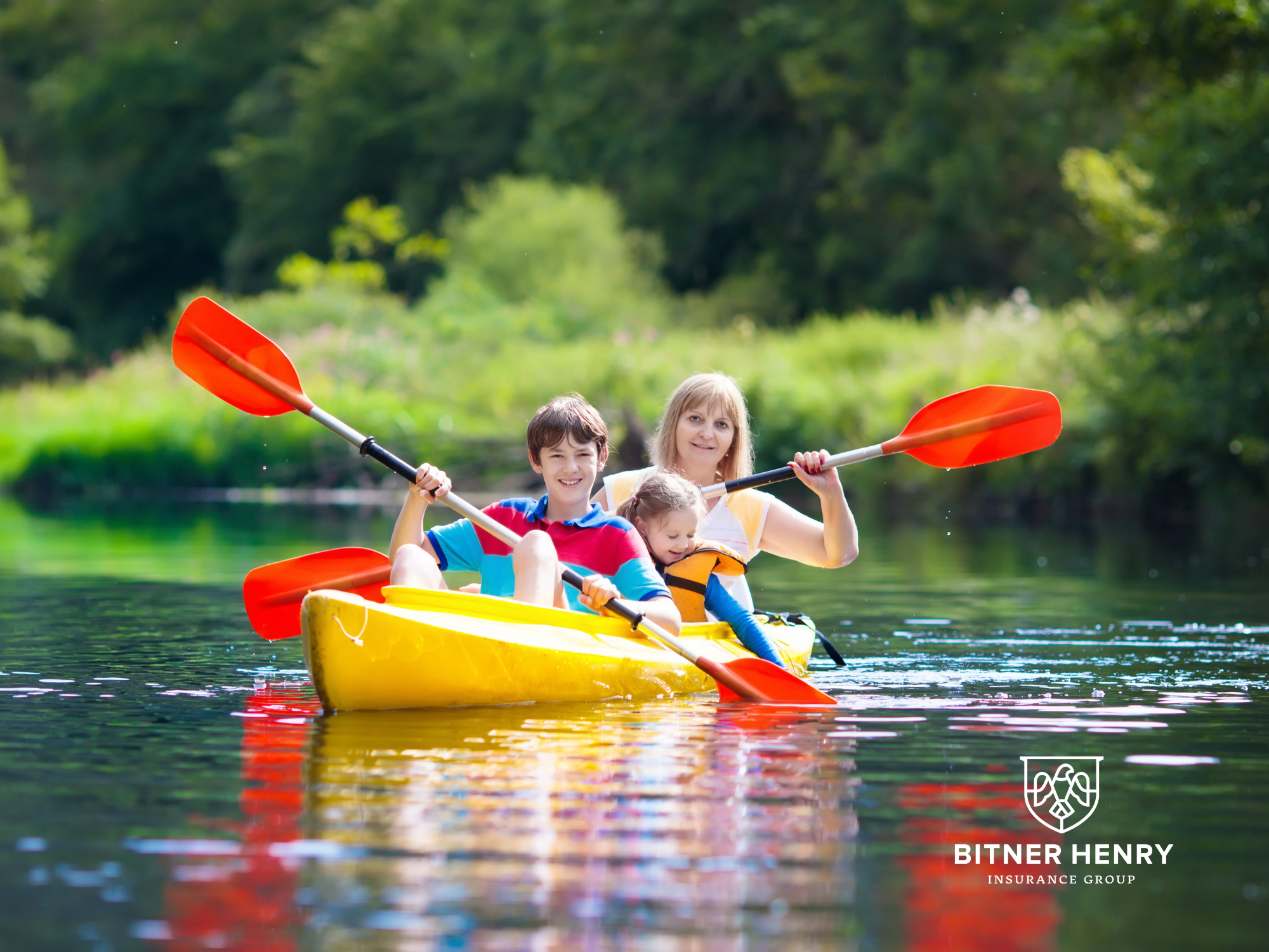 A group goes canoeing at a camp.