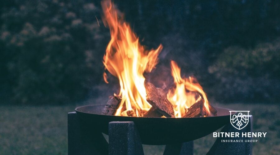 A burning fire. The Bitner Henry logo is in the bottom-right