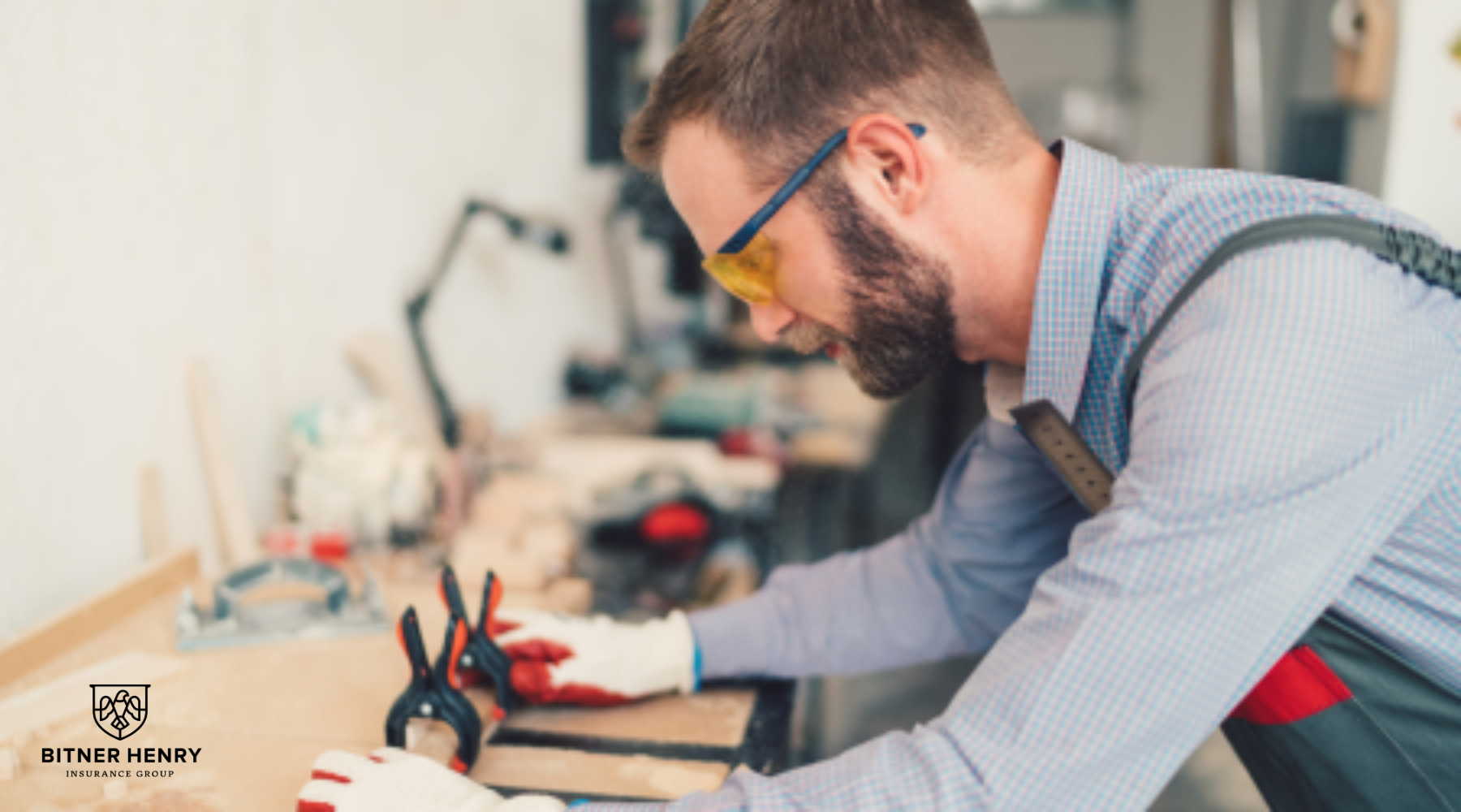 A carpenter measures a piece of wood