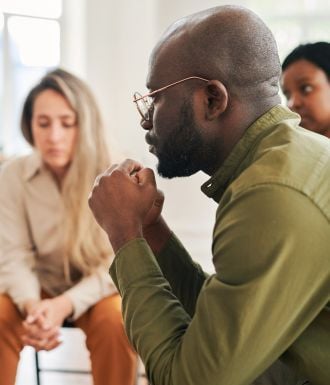 A counseling group talks and heals together.