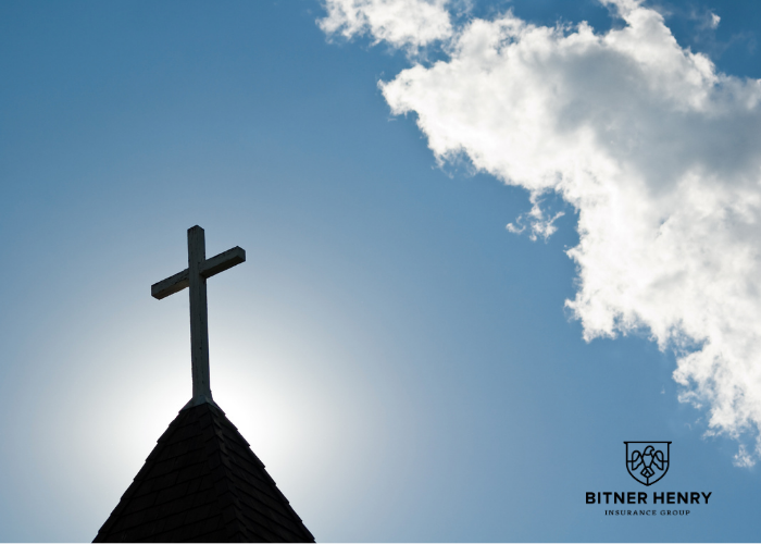A church steeple to symbolize church loans, with the bitner henry logo in the bottom right.