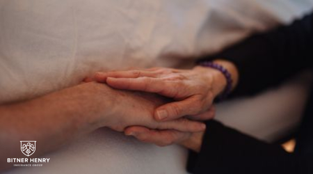 Someone holds someone's hand as they detox
